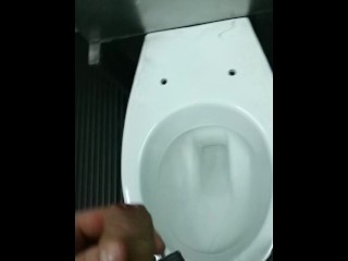 Pee desperation on floor in public toilet