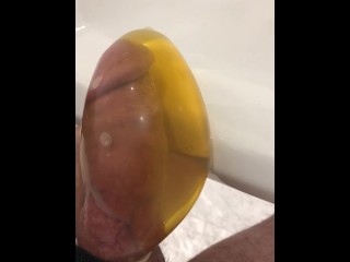 Desperate to pee, held until hard then let it go in super tight condom