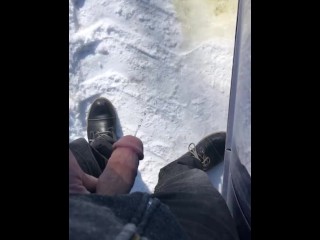 Desperate roadside piss in the snow 